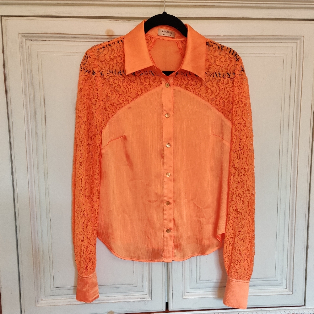 Bailey 44  Kiki Lace Top in Tangerine color.